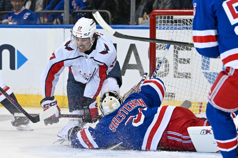 Apr 23, 2024; New York, New York, USA;  Washington Capitals center Dylan Strome (17) celebrates his goal against New York Rangers goaltender Igor Shesterkin (31) during the second period in game two of the first round of the 2024 Stanley Cup Playoffs at Madison Square Garden. Mandatory Credit: Dennis Schneidler-USA TODAY Sports