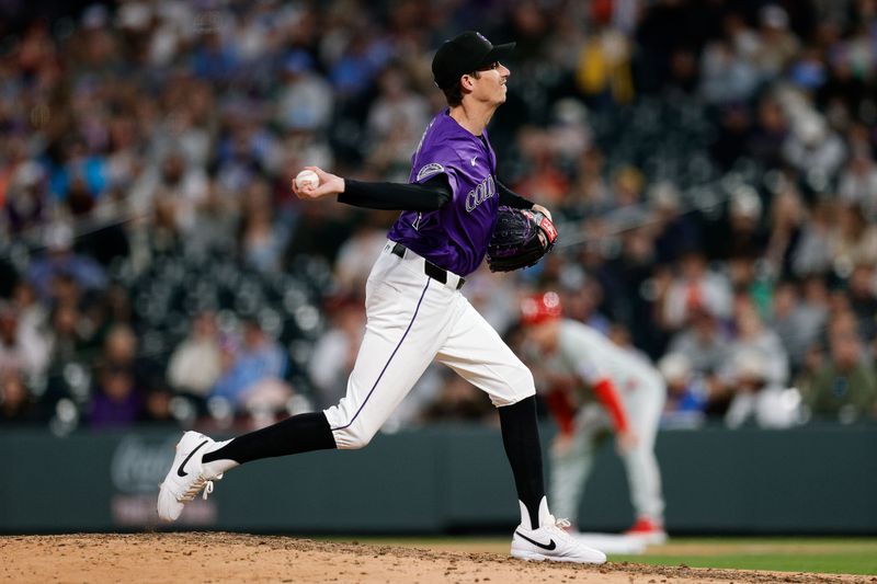May 20, 2025; Denver, Colorado, USA; Colorado Rockies relief pitcher Jimmy Herget (44) pitches in the seventh inning against the Philadelphia Phillies at Coors Field. Mandatory Credit: Isaiah J. Downing-Imagn Images