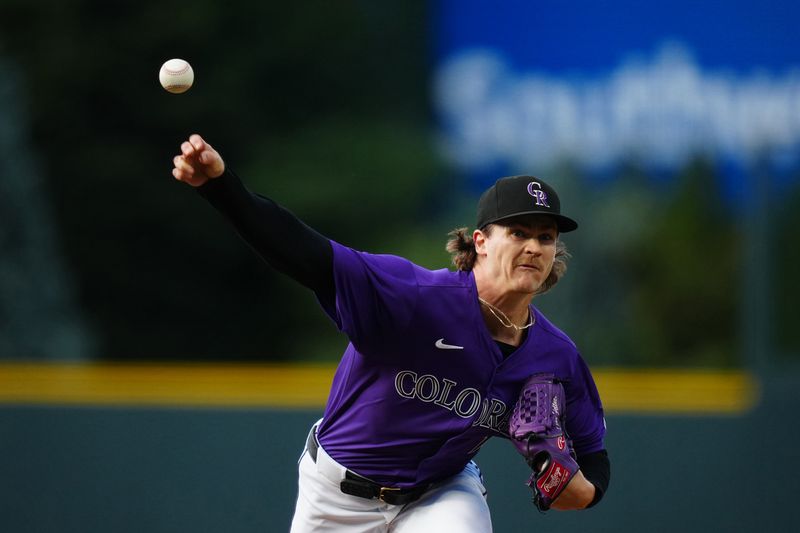 Jul 2, 2024; Denver, Colorado, USA;  Colorado Rockies starting pitcher Ryan Feltner (18) delivers a pitch in the first inning against the Milwaukee Brewers at Coors Field. Mandatory Credit: Ron Chenoy-USA TODAY Sports