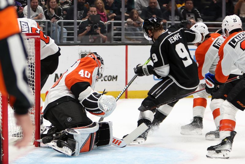 Nov 11, 2023; Los Angeles, California, USA;  Philadelphia Flyers goaltender Cal Petersen (40) defends the goal against Los Angeles Kings center Adrian Kempe (9) during the second period at Crypto.com Arena. Mandatory Credit: Kiyoshi Mio-USA TODAY Sports