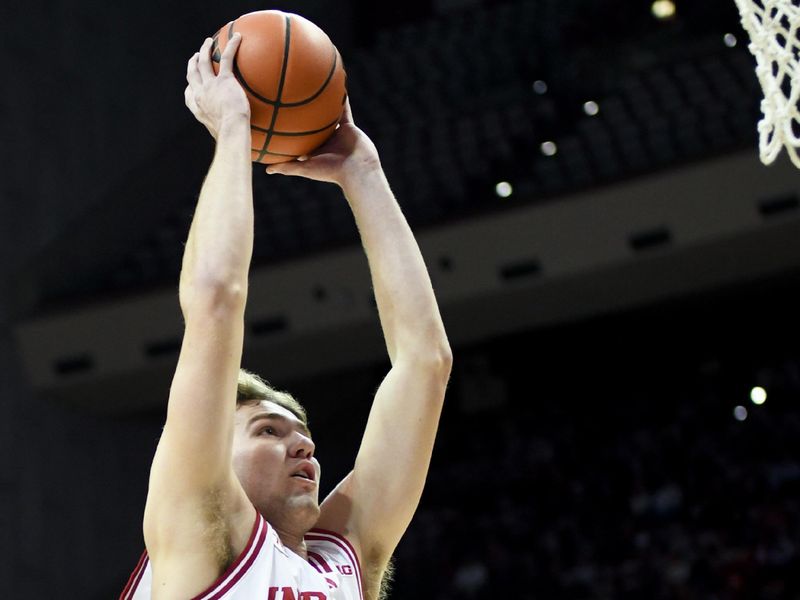 Nov 29, 2025; Bloomington, Indiana, USA; Indiana Hoosiers forward Trent Sisley (11) goes up for a dunk during the first half against the Bethune-Cookman Wildcats at Simon Skjodt Assembly Hall. Mandatory Credit: Robert Goddin-Imagn Images