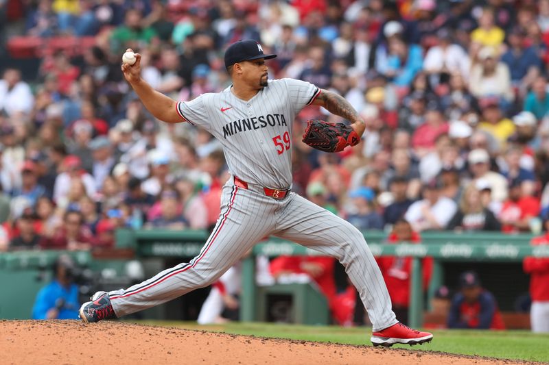 May 4, 2025; Boston, Massachusetts, USA; Minnesota Twins relief pitcher Jhoan Duran (59) delivers a pitch during the ninth inning against the Boston Red Sox at Fenway Park. Mandatory Credit: Paul Rutherford-Imagn Images