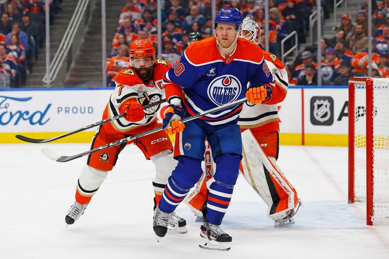 Jan 3, 2025; Edmonton, Alberta, CAN; Edmonton Oilers forward Corey Perry (90) tries to screen Anaheim Ducks goaltender Lucas Dostal (1) during the third period at Rogers Place. Mandatory Credit: Perry Nelson-Imagn Images