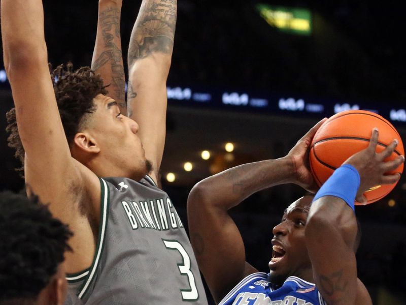 Mar 3, 2024; Memphis, Tennessee, USA; Memphis Tigers forward David Jones (8) drives to the basket as UAB Blazers forward Yaxel Lendeborg (3) defends during the first half at FedExForum. Mandatory Credit: Petre Thomas-USA TODAY Sports