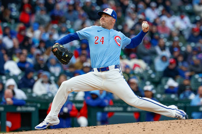 Apr 25, 2025; Chicago, Illinois, USA; Chicago Cubs relief pitcher Caleb Thielbar (24) delivers a pitch against the Philadelphia Phillies during the sixth inning at Wrigley Field. Mandatory Credit: Kamil Krzaczynski-Imagn Images