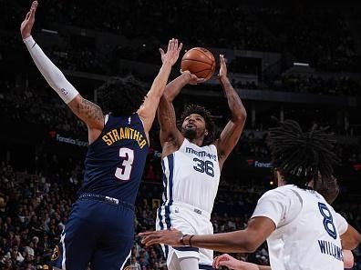 DENVER, CO - DECEMBER 28: Marcus Smart #36 of the Memphis Grizzlies drives to the basket during the game against the Denver Nuggets on December 28, 2023 at the Ball Arena in Denver, Colorado. NOTE TO USER: User expressly acknowledges and agrees that, by downloading and/or using this Photograph, user is consenting to the terms and conditions of the Getty Images License Agreement. Mandatory Copyright Notice: Copyright 2023 NBAE (Photo by Garrett Ellwood/NBAE via Getty Images)