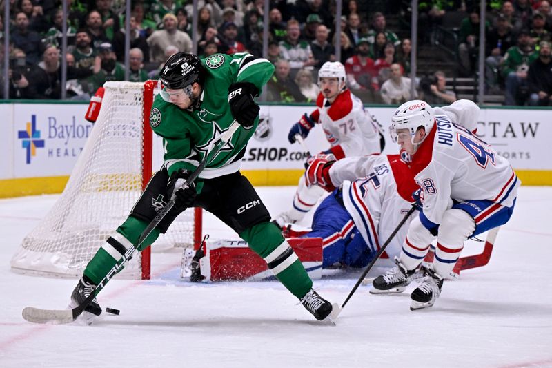 Jan 16, 2025; Dallas, Texas, USA; Dallas Stars center Logan Stankoven (11) attempts a between the legs shot on Montreal Canadiens goaltender Jakub Dobes (75) during the second period at the American Airlines Center. Mandatory Credit: Jerome Miron-Imagn Images