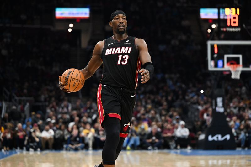 CLEVELAND, OH - MARCH 5:  Bam Adebayo #13 of the Miami Heat handles the ball during the game against the Cleveland Cavaliers on March 5, 2025 at Rocket Arena in Cleveland, Ohio. NOTE TO USER: User expressly acknowledges and agrees that, by downloading and/or using this Photograph, user is consenting to the terms and conditions of the Getty Images License Agreement. Mandatory Copyright Notice: Copyright 2025 NBAE (Photo by NBA Photos/NBAE via Getty Images)