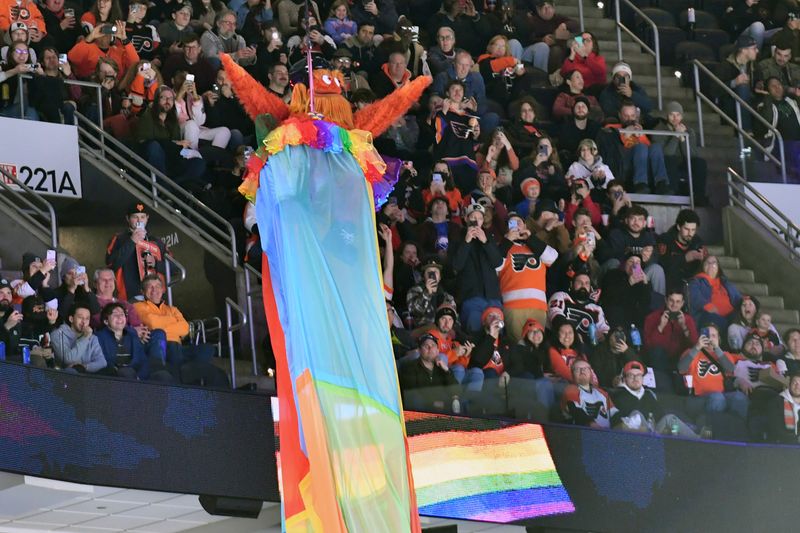 Jan 10, 2024; Philadelphia, Pennsylvania, USA; Philadelphia Flyers mascot Gritty performs during annual Pride Game against the Montreal Canadiens during the first period at Wells Fargo Center. Mandatory Credit: Eric Hartline-USA TODAY Sports