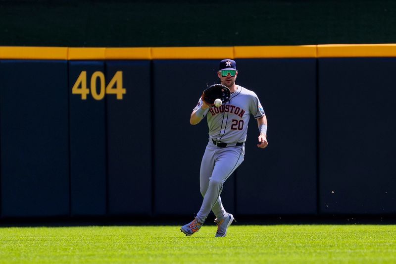 Sep 5, 2024; Cincinnati, Ohio, USA; Houston Astros outfielder Chas McCormick (20) fields the ball hit by Cincinnati Reds catcher Tyler Stephenson (not pictured) in the first inning at Great American Ball Park. Mandatory Credit: Katie Stratman-Imagn Images