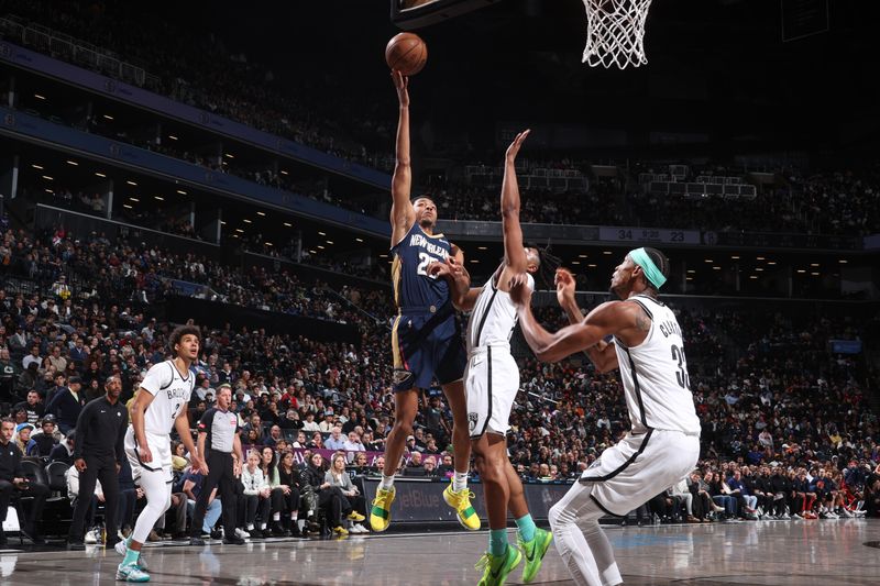 BROOKLYN, NY - MARCH 19: Trey Murphy III #25 of the New Orleans Pelicans drives to the basket during the game against the Brooklyn Nets on March 19, 2024 at Barclays Center in Brooklyn, New York. NOTE TO USER: User expressly acknowledges and agrees that, by downloading and or using this Photograph, user is consenting to the terms and conditions of the Getty Images License Agreement. Mandatory Copyright Notice: Copyright 2024 NBAE (Photo by Nathaniel S. Butler/NBAE via Getty Images)