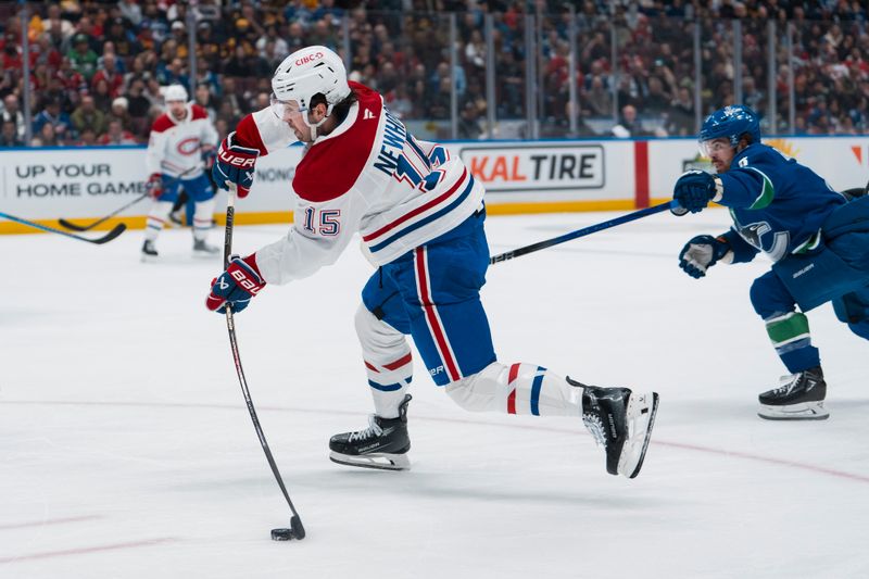 Mar 11, 2025; Vancouver, British Columbia, CAN; Montreal Canadiens forward Alex Newhook (15) shoots against the Vancouver Canucks in the first period at Rogers Arena. Mandatory Credit: Bob Frid-Imagn Images