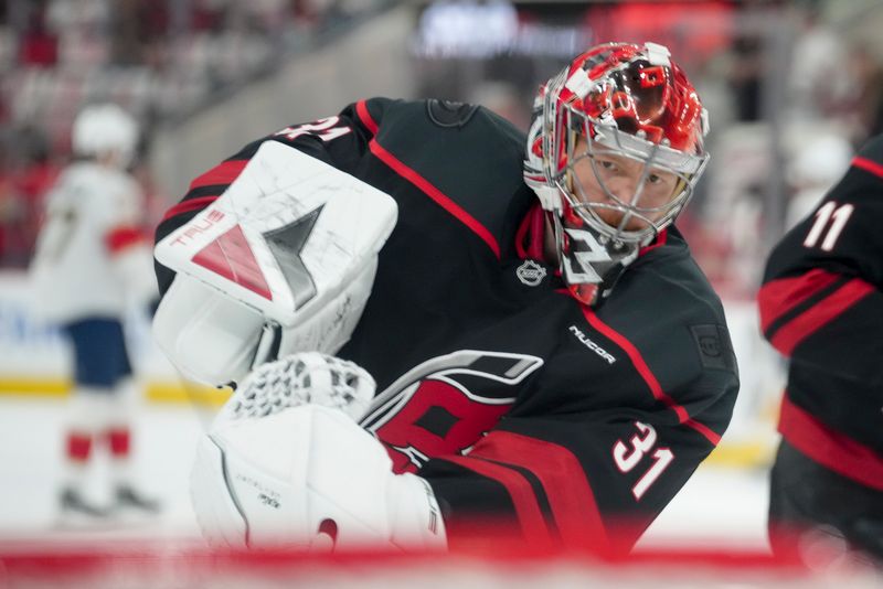 May 20, 2025; Raleigh, North Carolina, USA; Carolina Hurricanes goaltender Frederik Andersen (31) warms up priorto the during the first period against the Florida Panthers in game one of the Eastern Conference Final of the 2025 Stanley Cup Playoffs at Lenovo Center. Mandatory Credit: James Guillory-Imagn Images