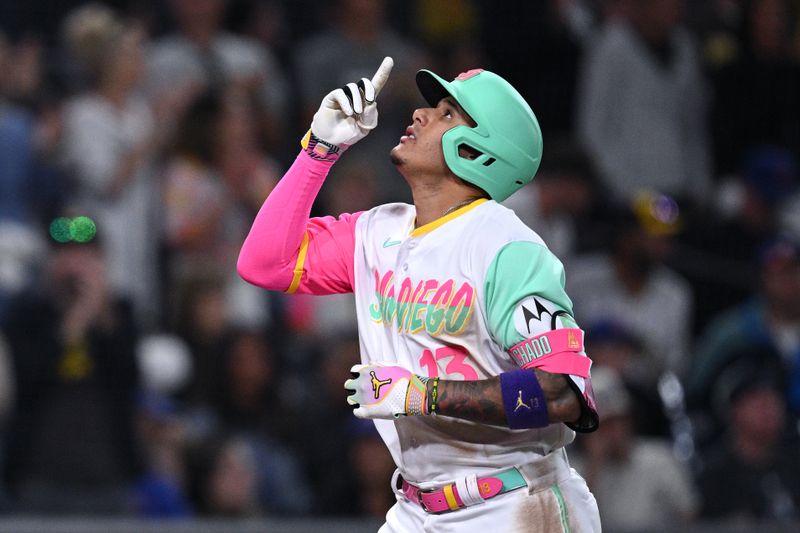 Jul 7, 2023; San Diego, California, USA; San Diego Padres third baseman Manny Machado (13) gestures after hitting a two-run home run against the New York Mets during the 10th inning at Petco Park. Mandatory Credit: Orlando Ramirez-USA TODAY Sports