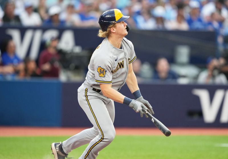 May 31, 2023; Toronto, Ontario, CAN; Milwaukee Brewers center fielder Joey Wiemer (28) reacts after hitting a double against the Toronto Blue Jays during the second inning at Rogers Centre. Mandatory Credit: Nick Turchiaro-USA TODAY Sports