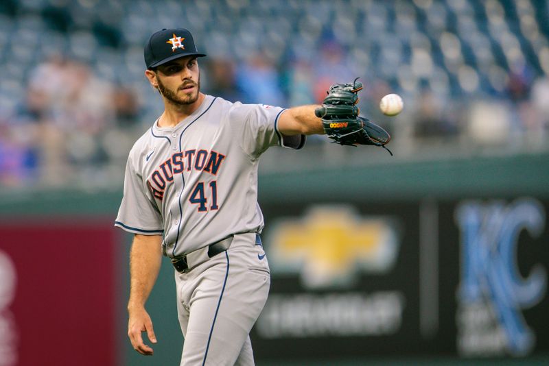 Apr 10, 2024; Kansas City, Missouri, USA; Houston Astros pitcher Spencer Arrighetti (41) reaches for a throw from first during the first inning against the Kansas City Royals at Kauffman Stadium. Mandatory Credit: William Purnell-USA TODAY Sports