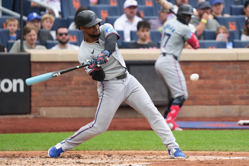 Aug 17, 2024; New York City, New York, USA; Miami Marlins second baseman Otto Lopez (61) bats during the first inning against the New York Mets at Citi Field. Mandatory Credit: Lucas Boland-USA TODAY Sports