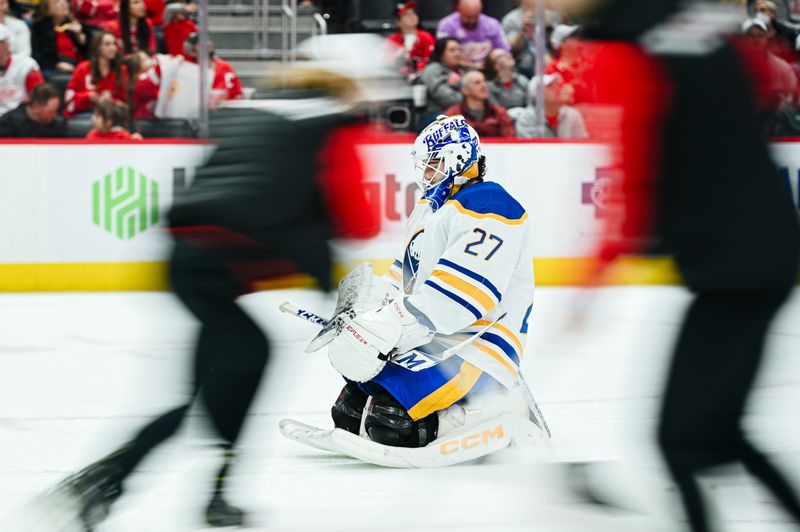 Apr 6, 2023; Detroit, Michigan, USA; Buffalo Sabres goaltender Devon Levi (27) meditates as the ice is cleared during a timeout in the second period against the Detroit Red Wings at Little Caesars Arena. Mandatory Credit: Tim Fuller-USA TODAY Sports