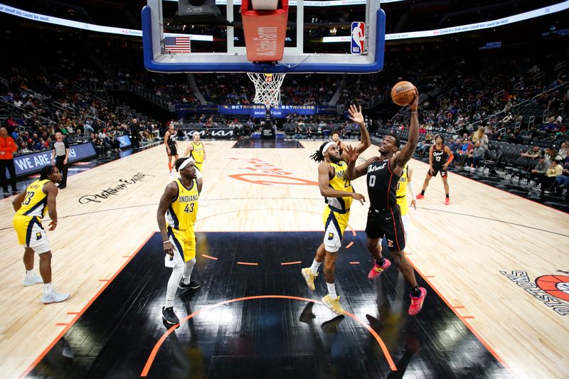 DETROIT, MI - MARCH 20: Jalen Duren #0 of the Detroit Pistons drives to the basket during the game against the Indiana Pacers on March 20, 2024 at Little Caesars Arena in Detroit, Michigan. NOTE TO USER: User expressly acknowledges and agrees that, by downloading and/or using this photograph, User is consenting to the terms and conditions of the Getty Images License Agreement. Mandatory Copyright Notice: Copyright 2024 NBAE (Photo by Brian Sevald/NBAE via Getty Images)