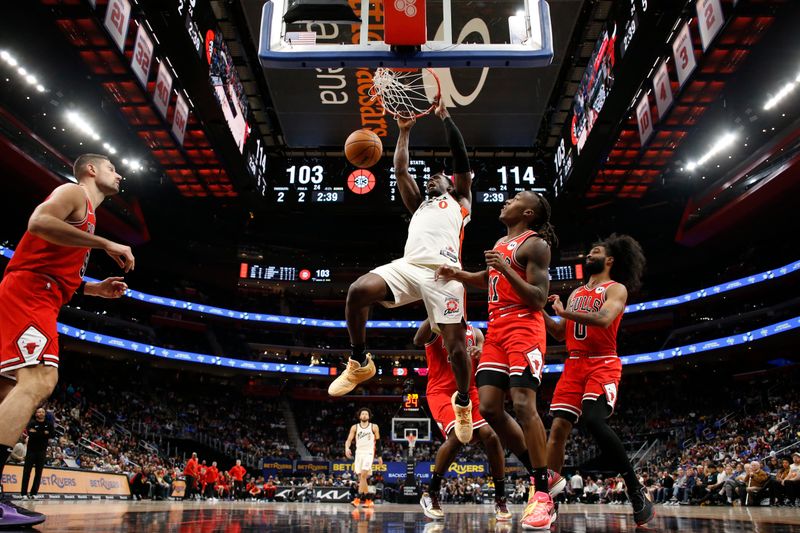 DETROIT, MI - NOVEMBER 18: Jalen Duren #0 of the Detroit Pistons dunks the ball during the game against the Chicago Bulls on November 18, 2024 at Little Caesars Arena in Detroit, Michigan. NOTE TO USER: User expressly acknowledges and agrees that, by downloading and/or using this photograph, User is consenting to the terms and conditions of the Getty Images License Agreement. Mandatory Copyright Notice: Copyright 2024 NBAE (Photo by Brian Sevald/NBAE via Getty Images)