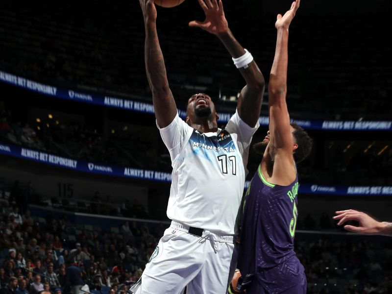 NEW ORLEANS, LA - JANUARY 7: Naz Reid #11 of the Minnesota Timberwolves drives to the basket during the game against the New Orleans Pelicans on January 7, 2025 at the Smoothie King Center in New Orleans, Louisiana. NOTE TO USER: User expressly acknowledges and agrees that, by downloading and or using this Photograph, user is consenting to the terms and conditions of the Getty Images License Agreement. Mandatory Copyright Notice: Copyright 2025 NBAE(Photo by Layne Murdoch Jr./NBAE via Getty Images)