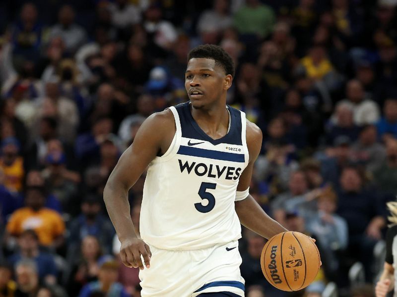 SAN FRANCISCO, CALIFORNIA - DECEMBER 06: Anthony Edwards #5 of the Minnesota Timberwolves dribbles up the court during their game against the Golden State Warriors during the second half at Chase Center on December 06, 2024 in San Francisco, California. NOTE TO USER: User expressly acknowledges and agrees that, by downloading and/or using this photograph, user is consenting to the terms and conditions of the Getty Images License Agreement.   (Photo by Ezra Shaw/Getty Images)