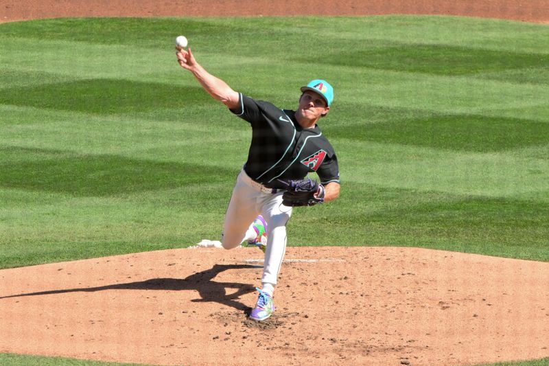 Feb 25, 2026; Salt River Pima-Maricopa, Arizona, USA; Arizona Diamondbacks pitcher Drey Jameson (99) throws in the second inning against the Los Angeles Dodgers at Salt River Fields at Talking Stick. Mandatory Credit: Matt Kartozian-Imagn Images