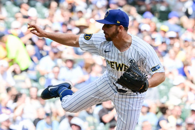 Jun 2, 2024; Milwaukee, Wisconsin, USA;  Milwaukee Brewers relief pitcher Kevin Herget (57) pitches against the Chicago White Sox in the sixth inning at American Family Field. Mandatory Credit: Benny Sieu-USA TODAY Sports