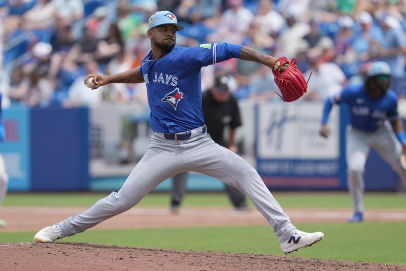Mar 15, 2026; Port St. Lucie, Florida, USA; Toronto Blue Jays pitcher Angel Bastardo (99) pitches in the third inning against the New York Mets at Clover Park. Mandatory Credit: Jim Rassol-Imagn Images Mar 15, 2026; Port St. Lucie, Florida, USA; Toronto Blue Jays pitcher Angel Bastardo (99) pitches in the third inning against the New York Mets at Clover Park. Mandatory Credit: Jim Rassol-Imagn Images