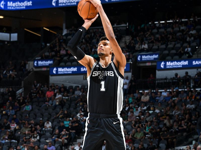 SAN ANTONIO, TX - NOVEMBER 13: Victor Wembanyama #1 of the San Antonio Spurs three point basket during the game against the Washington Wizards on November 13, 2024 at the Frost Bank Center in San Antonio, Texas. NOTE TO USER: User expressly acknowledges and agrees that, by downloading and or using this photograph, user is consenting to the terms and conditions of the Getty Images License Agreement. Mandatory Copyright Notice: Copyright 2024 NBAE (Photos by Michael Gonzales/NBAE via Getty Images)