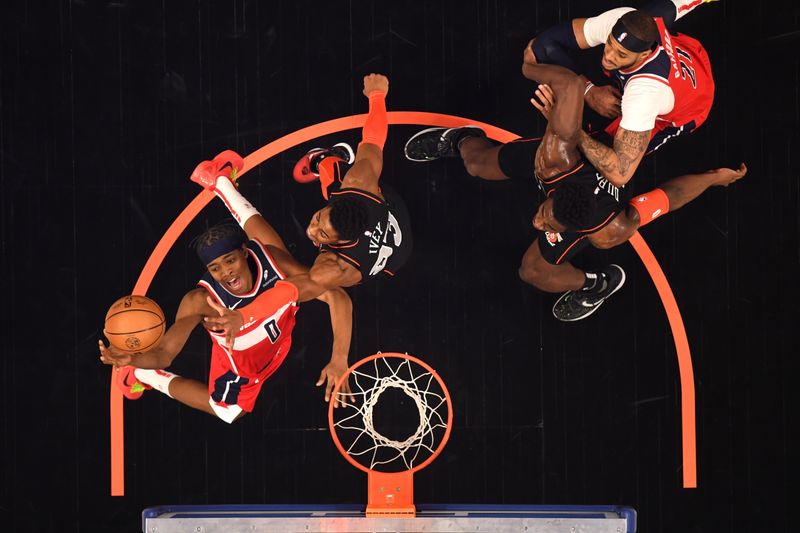 DETROIT, MI - JANUARY 27: Bilal Coulibaly #0 of the Washington Wizards drives to the basket during the game against the Detroit Pistons on January 27, 2024 at Little Caesars Arena in Detroit, Michigan. NOTE TO USER: User expressly acknowledges and agrees that, by downloading and/or using this photograph, User is consenting to the terms and conditions of the Getty Images License Agreement. Mandatory Copyright Notice: Copyright 2024 NBAE (Photo by Chris Schwegler/NBAE via Getty Images)