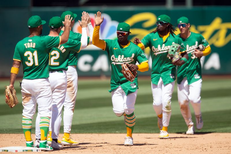 Aug 7, 2024; Oakland, California, USA; Oakland Athletics players celebrate after defeating the Chicago White Sox at Oakland-Alameda County Coliseum. Mandatory Credit: D. Ross Cameron-USA TODAY Sports