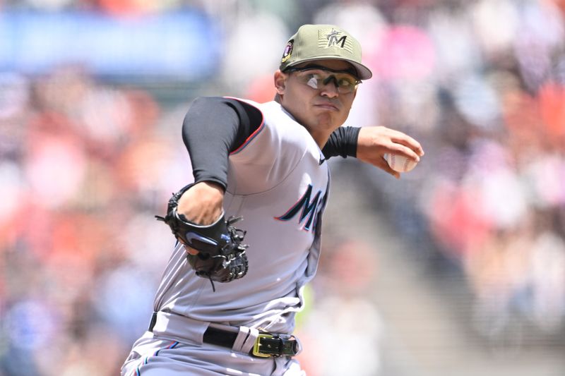 May 21, 2023; San Francisco, California, USA; Miami Marlins starting pitcher Jesus Luzardo (44) throws a pitch against the San Francisco Giants during the first inning at Oracle Park. Mandatory Credit: Robert Edwards-USA TODAY Sports