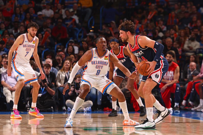 OKLAHOMA CITY, OK - FEBRUARY 23: Jalen Williams #8 of the Oklahoma City Thunder plays defense during the game against the Washington Wizards on February 23, 2024 at Paycom Arena in Oklahoma City, Oklahoma. NOTE TO USER: User expressly acknowledges and agrees that, by downloading and or using this photograph, User is consenting to the terms and conditions of the Getty Images License Agreement. Mandatory Copyright Notice: Copyright 2024 NBAE (Photo by Zach Beeker/NBAE via Getty Images)