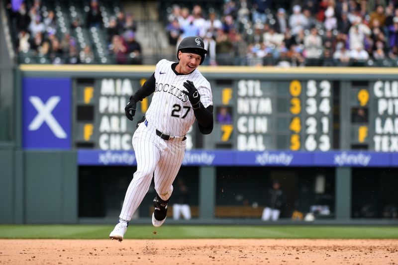 Apr 19, 2025; Denver, Colorado, USA; Colorado Rockies left fielder Jordan Bech (27) runs to third on an RBI triple during the seventh inning against the Washington Nationals at Coors Field. Mandatory Credit: Christopher Hanewinckel-Imagn Images