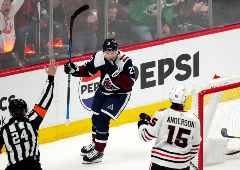 Mar 4, 2024; Denver, Colorado, USA;Colorado Avalanche center Nathan MacKinnon (29) celebrates his his goal during the first period against the Chicago Blackhawks at Ball Arena. Mandatory Credit: Ron Chenoy-USA TODAY Sports