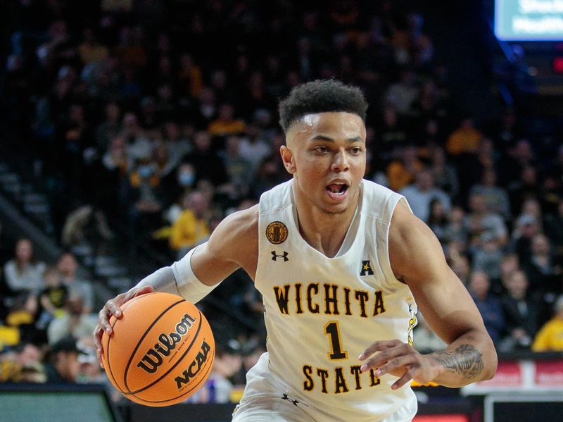 Jan 14, 2023; Wichita, Kansas, USA; Wichita State Shockers guard Xavier Bell (1) brings the ball up court during the second half against the Tulsa Golden Hurricane at Charles Koch Arena. Mandatory Credit: William Purnell-USA TODAY Sports