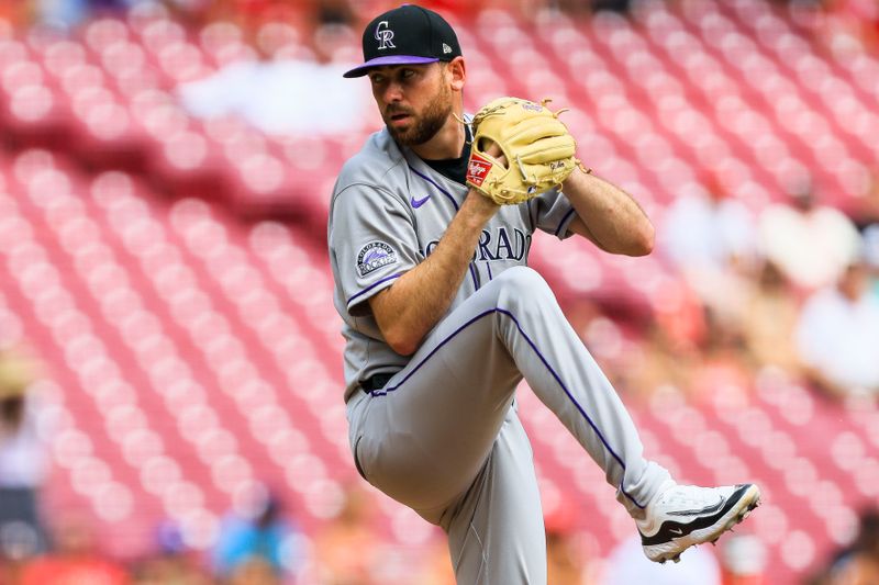 Jul 13, 2025; Cincinnati, Ohio, USA; Colorado Rockies starting pitcher Austin Gomber (26) pitches against the Cincinnati Reds in the first inning at Great American Ball Park. Mandatory Credit: Katie Stratman-Imagn Images