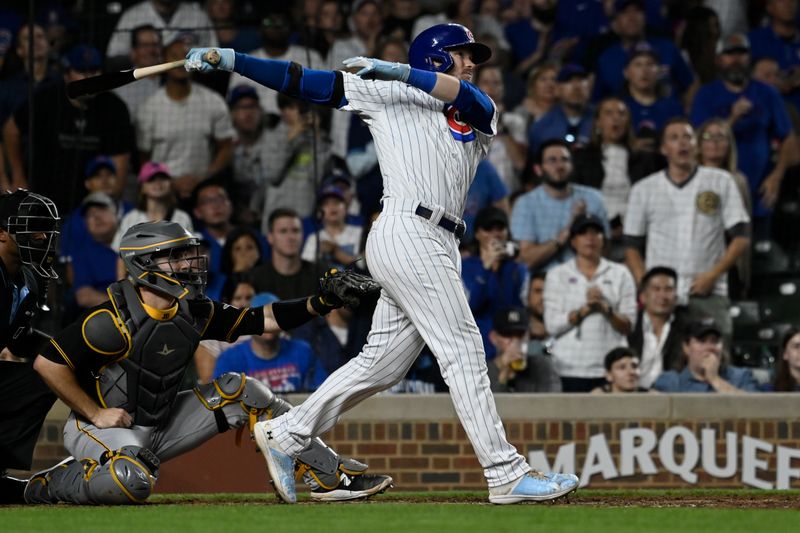 Sep 20, 2023; Chicago, Illinois, USA; Chicago Cubs left fielder Ian Happ (8) hits a grand slam against the Pittsburgh Pirates during the fifth inning at Wrigley Field. Mandatory Credit: Matt Marton-USA TODAY Sports