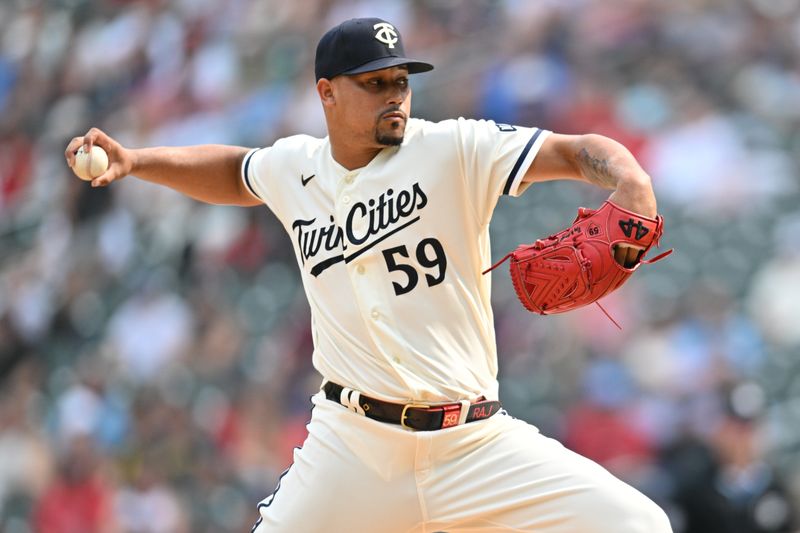 Aug 20, 2023; Minneapolis, Minnesota, USA; Minnesota Twins relief pitcher Jhoan Duran (59) throws a pitch against the Pittsburgh Pirates during the ninth inning at Target Field. Mandatory Credit: Jeffrey Becker-USA TODAY Sports