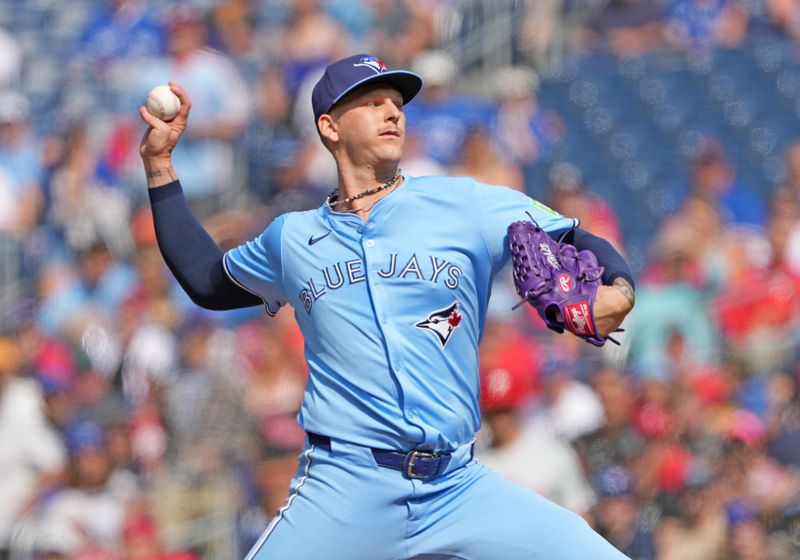 Sep 4, 2024; Toronto, Ontario, CAN; Toronto Blue Jays starting pitcher Bowden Francis (44) throws a pitch against the Philadelphia Phillies during the first inning at Rogers Centre. Mandatory Credit: Nick Turchiaro-Imagn Images