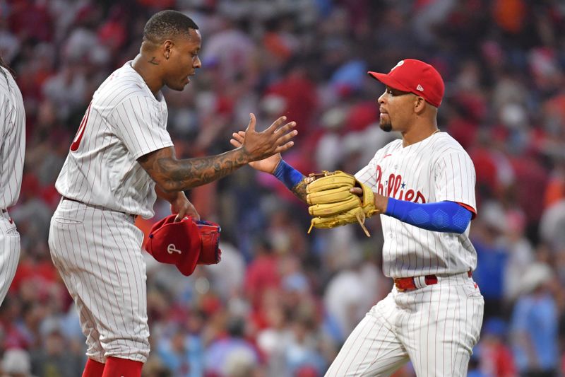 Jul 26, 2023; Philadelphia, Pennsylvania, USA; Philadelphia Phillies relief pitcher Gregory Soto (30) and third baseman Edmundo Sosa (33) celebrate win against the Baltimore Orioles at Citizens Bank Park. Mandatory Credit: Eric Hartline-USA TODAY Sports