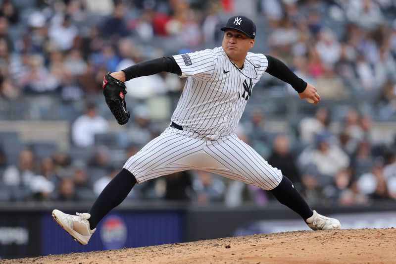 Apr 21, 2024; Bronx, New York, USA; New York Yankees relief pitcher Victor Gonzalez (47) pitches against the Tampa Bay Rays during the ninth inning at Yankee Stadium. Mandatory Credit: Brad Penner-USA TODAY Sports