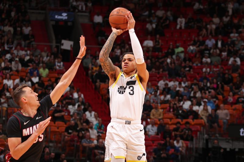 MIAMI, FL - MARCH 2: Keyonte George #3 of the Utah Jazz three point basket during the game against the Miami Heat on March 2, 2024 at Kaseya Center in Miami, Florida. NOTE TO USER: User expressly acknowledges and agrees that, by downloading and or using this Photograph, user is consenting to the terms and conditions of the Getty Images License Agreement. Mandatory Copyright Notice: Copyright 2024 NBAE (Photo by Issac Baldizon/NBAE via Getty Images)