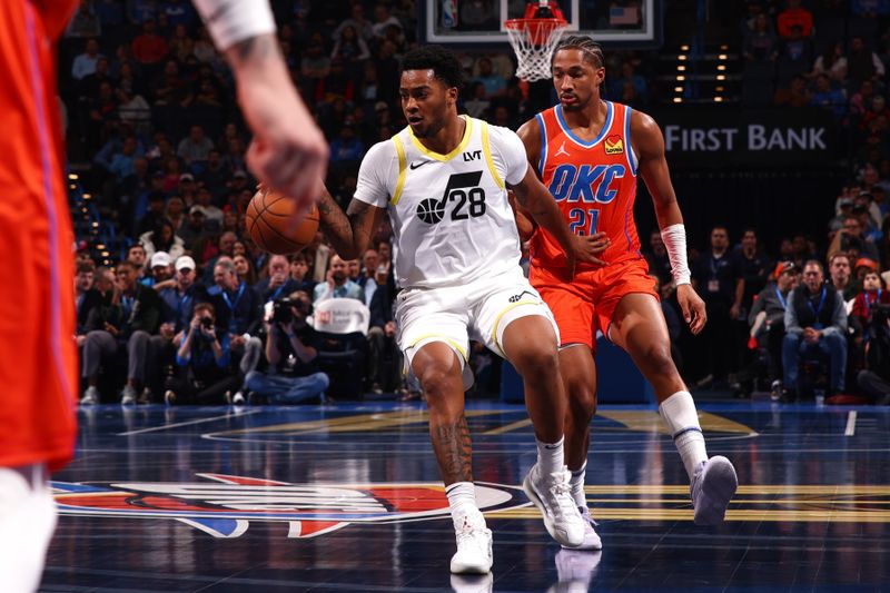 OKLAHOMA CITY, OK - DECEMBER 3: Brice Sensabaugh #28 of the Utah Jazz handles the ball during the game against the Oklahoma City Thunder during the Emirates NBA Cup game on on December 3, 2024 at Paycom Center in Oklahoma City, Oklahoma. NOTE TO USER: User expressly acknowledges and agrees that, by downloading and or using this photograph, User is consenting to the terms and conditions of the Getty Images License Agreement. Mandatory Copyright Notice: Copyright 2024 NBAE (Photo by Zach Beeker/NBAE via Getty Images)