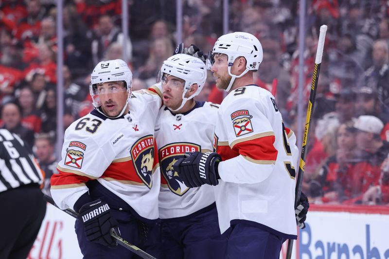 Oct 16, 2025; Newark, New Jersey, USA; Florida Panthers center Evan Rodrigues (17) celebrates his goal against the New Jersey Devils during the first period at Prudential Center. Mandatory Credit: Ed Mulholland-Imagn Images