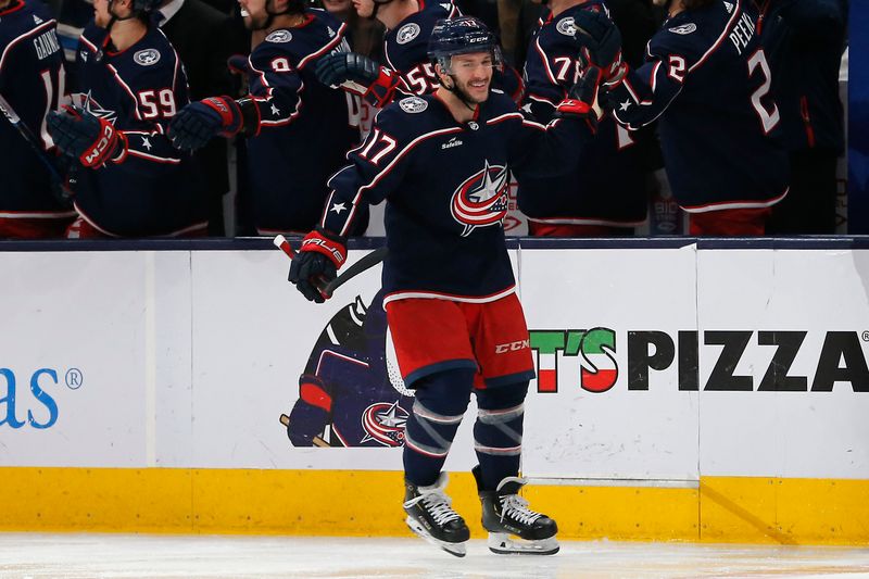 Dec 23, 2023; Columbus, Ohio, USA; Columbus Blue Jackets right wing Justin Danforth (17) celebrates his goal against the Toronto Maple Leafs during the second period at Nationwide Arena. Mandatory Credit: Russell LaBounty-USA TODAY Sports