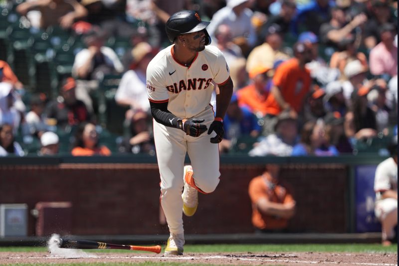 Jun 27, 2024; San Francisco, California, USA; San Francisco Giants designated hitter Jorge Soler (2) runs to first base after hitting a ground-rule double against the Chicago Cubs during the sixth inning at Oracle Park. Mandatory Credit: Darren Yamashita-USA TODAY Sports