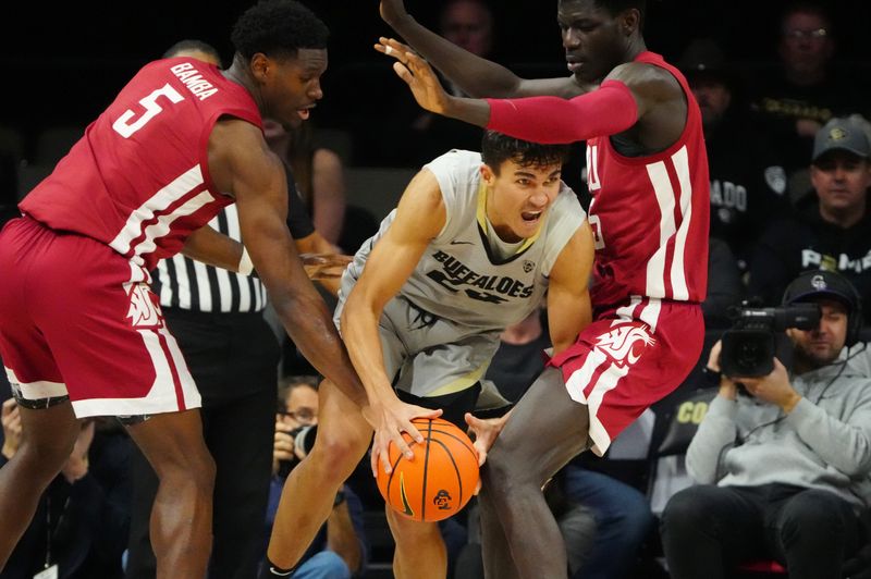 Jan 22, 2023; Boulder, Colorado, USA; Washington State Cougars guard TJ Bamba (5) and forward Mouhamed Gueye (35) defend on Colorado Buffaloes forward Tristan da Silva (23) in the second half at the CU Events Center. Mandatory Credit: Ron Chenoy-USA TODAY Sports