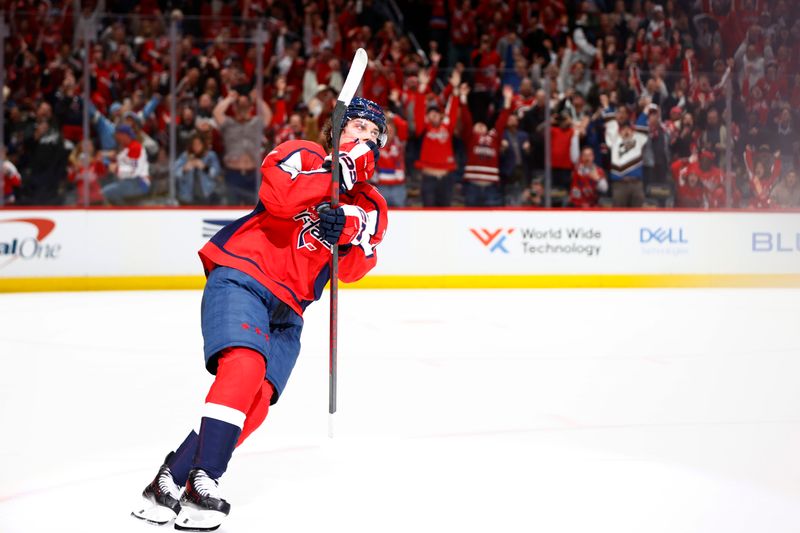 Mar 22, 2024; Washington, District of Columbia, USA; Washington Capitals center Dylan Strome (17) celebrates after scoring the game winning goal during a shootout against the Carolina Hurricanes at Capital One Arena. Mandatory Credit: Amber Searls-USA TODAY Sports